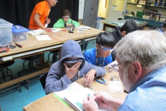 some of the maker class, including me needed a little help with pieces of the board Guid helping solder